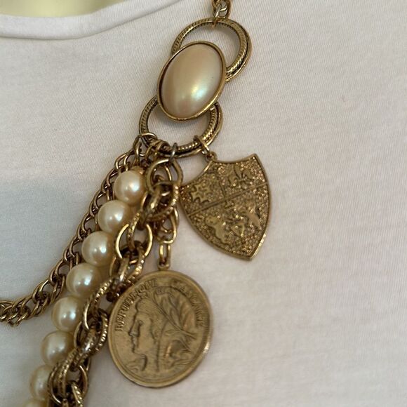 Triple strand  gold & pearl statement necklace with gold coin & crest pendant - Picture 3 of 5